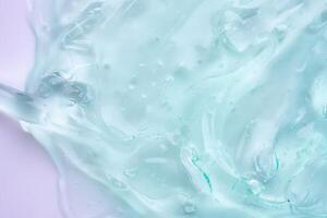 transparente Claro azul líquido sérum gel Cosmético textura fundo foto