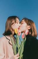ai gerado mulheres beijo no meio Primavera tulipas foto