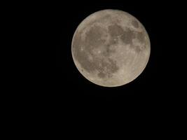 lua cheia vista com telescópio foto