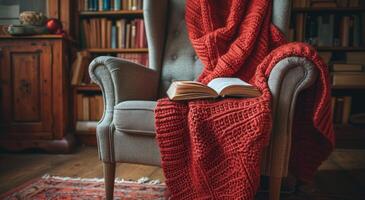 ai gerado cadeira com vermelho cobertor e livro foto