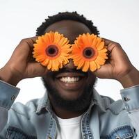 ai gerado africano americano homem cobre olhos com dois laranja gerberas foto