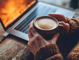 ai gerado jovem mulher leva uma pausa bebendo quente café com fumaça depois de estudando ou trabalhando em uma de madeira mesa. seletivo foco em copo foto