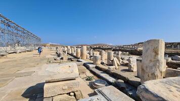 Delos ilha, uma jóia dentro a egeu mar, detém rico mitológico e arqueológico significado foto