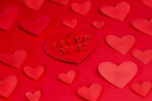 Eu amor você. amor papel de parede, vermelho corações forma em vermelho fundo foto