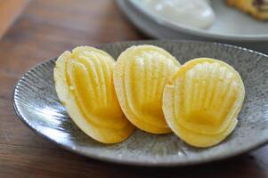 madalena, madeleines ou francês pão foto