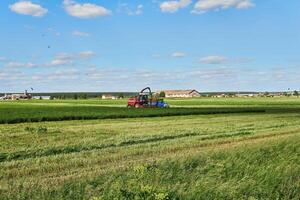 agrícola panorama com combinar colheitadeira foto