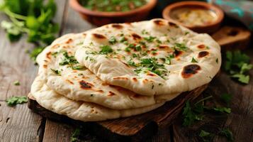 ai gerado indiano naan pão em de madeira mesa. foto