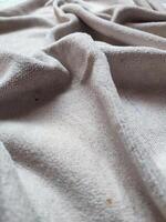 textura, padrão, fundo do sujo branco toalha exposto para luz solar foto