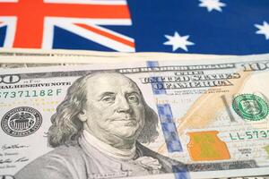 nos dólar notas em EUA Austrália bandeira fundo, o negócio e finança. foto