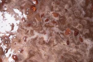 fundo textura do ebulição feijões dentro mexicano cozinha foto