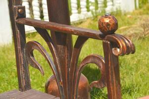 forjado metal cobre elemento para acabamento uma cadeira, banco. lindo vintage padronizar. foto