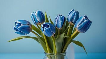 ai gerado lindo tulipa flores em uma azul fundo foto