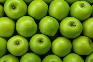 ai gerado grande quantidade do verde maçãs fundo do maçãs foto