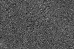 Sombrio textura detalhes do superfície do asfalto ou tamac em Novo estrada, fundo ou papel de parede, metrial cpncept Projeto foto