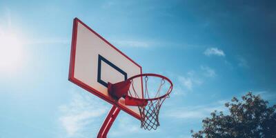 ai gerado ao ar livre basquetebol aro com vermelho acentos debaixo uma Claro azul céu com luz solar. generativo ai foto