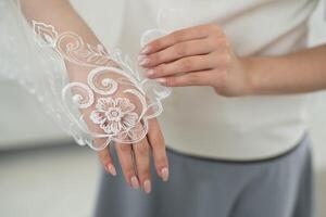 Casamento véu fechar-se do bordado padronizar em mão foto