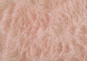 rosado laranja ou peachy Rosa falso pele fundo. fechar acima superfície lã textura. mínimo fundo conceito. na moda cor luxo layout. fofo pele plano deitar. retro moda estético ideia. cópia de espaço. foto