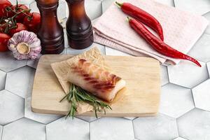 cru bacalhau peixe bife para cozinhando foto