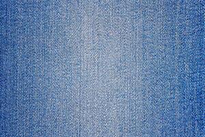 perspectiva e fechar-se Visão para abstrato espaço do esvaziar luz azul natural limpar \ limpo jeans textura. foto
