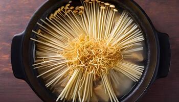 ai gerado enoki cogumelos chamado dourado agulha. guarnição, enfeite, adorno. Visão a partir de acima. chinês cozinha, hotpot ingrediente foto