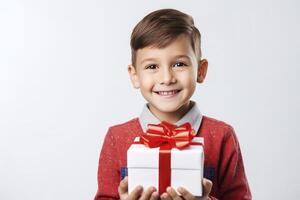 ai gerado uma encantador jovem Garoto com branco presente caixa e vermelho arco para mãe dia ou aniversário. foto