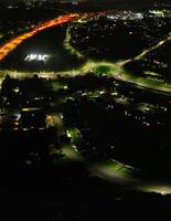 aéreo panorâmico Visão do iluminado central Hatfield cidade do Inglaterra Reino Unido durante noite. marcha 9º, 2024 foto