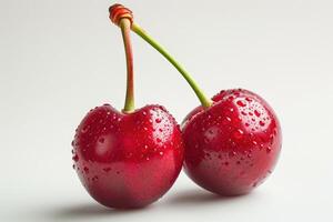 ai gerado dois cerejas com água gotas dois cerejas cintilar com água gotas, exibindo seus vibrante cores e frescor. foto