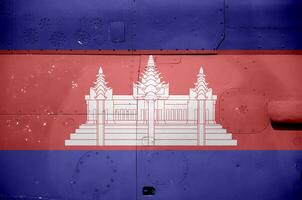 Camboja bandeira retratado em lado parte do militares blindado helicóptero fechar-se. exército forças aeronave conceptual fundo foto