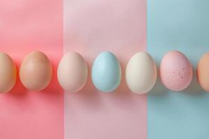 ai gerado topo Visão pastel Páscoa ovos em Rosa fundo com cópia de espaço. feriado bandeira com colorida frango cascas de ovo foto