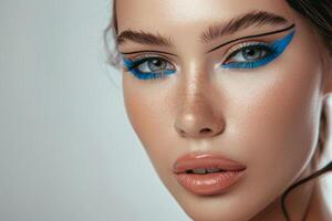ai gerado moda elegância azul delineador Maquiagem em modelo olhos. cosméticos e Maquiagem conceito. generativo ai foto