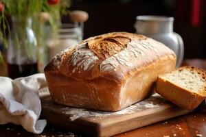 ai gerado branco fresco caseiro pão e uma fatiado peça em mesa dentro de casa foto