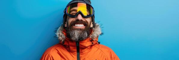 ai gerado sorridente homem com uma barba dentro esqui equipamento em uma azul fundo foto