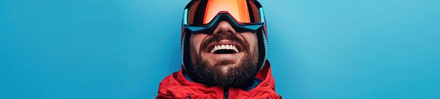 ai gerado sorridente homem com uma barba dentro esqui equipamento em uma azul fundo foto