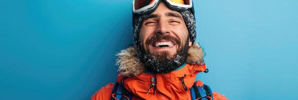 ai gerado sorridente homem com uma barba dentro esqui equipamento em uma azul fundo foto