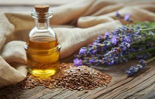 ai gerado garrafa do essencial óleo com fresco lavanda galhos e seco linho sementes foto