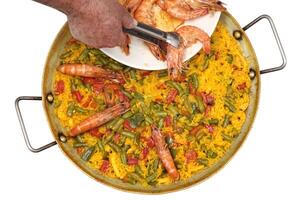 passo a passo guia para frutos do mar paella, a a maioria típica dentro Espanha foto