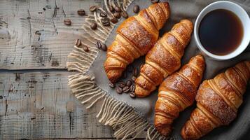 ai gerado dois croissants em uma prato com café copo foto