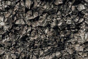 basalto pedras textura em vik praia, Islândia foto