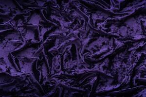 enigmático elegância, veludo fundo dentro Sombrio roxo. foto