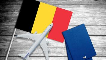 avião com nacional bandeira do Bélgica em uma fundo foto