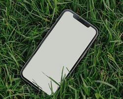 ai gerado moderno Smartphone brincar cena. Smartphone brincar modelo com em branco branco tela em verde grama. foto