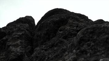 gigante pedras em nublado céu fundo. grampo. fechar acima do cinzento pedra textura. foto