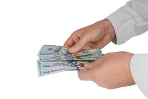 homem mãos com dólar dinheiro isolado em branco fundo foto