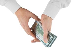 homem mãos com dólar dinheiro isolado em branco fundo foto