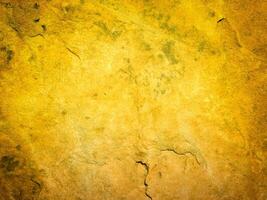 textura do amarelo pedra dentro a jardim foto