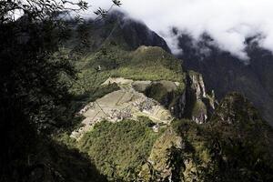 Machu picchu, Peru, 2015 - distante Visão do inca ruínas a partir de Huayna picchu foto