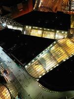 aéreo noite Visão do iluminado cidade Centro edifícios do Birmingham central cidade do Inglaterra Unidos reino. marcha 30, 2024 foto