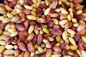 pistache, amendoim, Maravilhoso amendoim composição para saudável e dietético nutrição.avelã. verde fresco pistachios Como textura. Gaziantep, Turquia foto