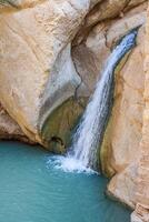 cascata dentro montanha oásis chebika, Tunísia, África foto