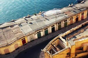 panorâmico Horizonte Visão do antigo defesas do Valletta e a grande Porto, Malta foto